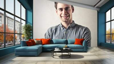 Smiling young man Wall mural