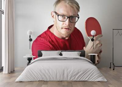 young man play ping pong Wall mural