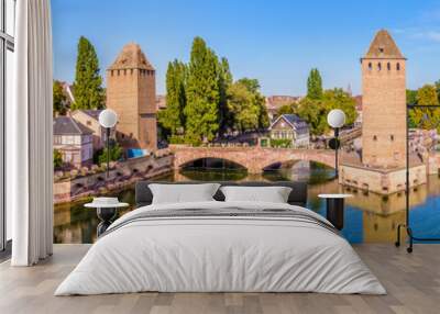 Panoramic view of the Ponts Couverts (covered bridges), a medieval set of bridges and defensive towers on the river Ill at the entrance of the Petite France historic quarter in Strasbourg, France. Wall mural