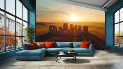 Sunset over Stonehenge, showcasing ancient stone circle against a serene sky Wall mural