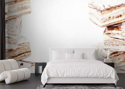 Few pieces of nougat stacked together on white Wall mural