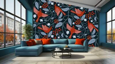 Winter vector seamless pattern with Northern cardinal birds, red berries, floral elements. Red birds on dark blue background. Christmas surface design with wild flying birds for fabrics, wallpaper Wall mural