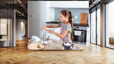 tiramisu making process in the kitchen- little girl making Italian desert with cocoa and espresso-dipped ladyfingers with mascarpone cream (step by step) Wall mural