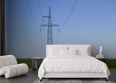 High voltage power line against blue sky Wall mural