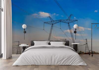 High voltage power line against blue sky Wall mural