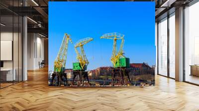 Old cranes on city boulevard in Szczecin, Poland Wall mural