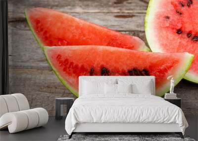 Sliced fresh sweet watermelon on a rustic wooden table Wall mural