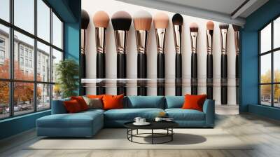 Set of makeup brushes with matte metal nozzle in a transparent brush holder on white background Wall mural