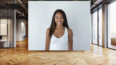 A cute woman Smiling wearing white tank Wall mural