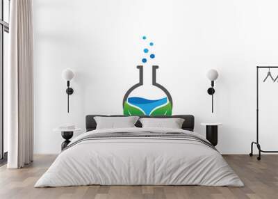 Beaker Lab round flask with a chemical substance inside and leaves make Bubbles for logo design Wall mural