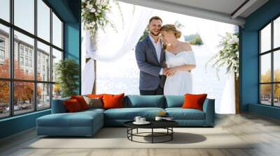 wedding ceremony on a high pier near the river Wall mural