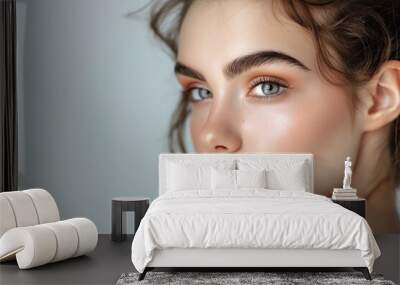 closeup portrait of woman with natural healthy skin and colored eyes, facial skincare and beauty concept Wall mural