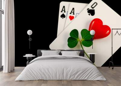 Spades and heart on the same playing card. Heart, clover. On black backgro. Heart, clover. On black background. With copy space. Wall mural