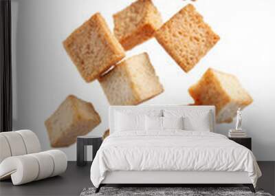 Wheat square croutons croutons falling on a white background. Isolated Wall mural