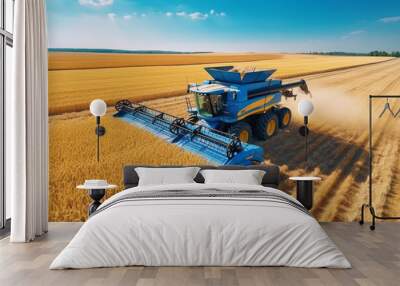 The harvest of successfully grown wheat with a large combine harvester. The fertile land extends to the horizon. Labor sustains global food supply. Concepts of production and agriculture. Wall mural