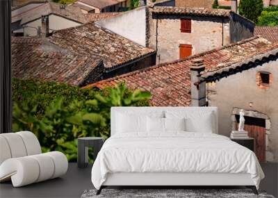 Picturesque rooftops of typical houses in old town Vallon-Pont-d’Arc in Provence. Architecture of Provence in southern France on a sunny summer day. Tourist destination near famous Ardèche canyon. Wall mural