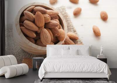 group of almonds from wood bowl Wall mural