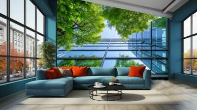 Eco-friendly building in the modern city. Sustainable glass office building with tree for reducing carbon dioxide. Office building with green environment Wall mural