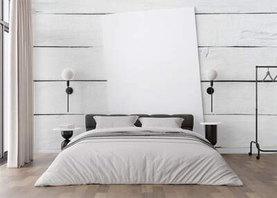 Blank white sheet of paper on rustic wooden background. Top view Wall mural