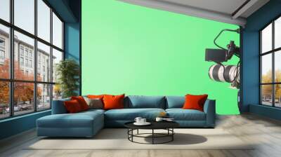 video camera on lighty green background, movie or television broadcasting banner Wall mural