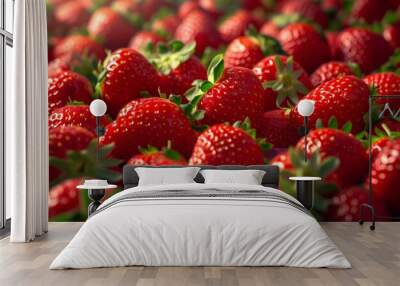 A close-up view of a large number of beautiful and red fresh farm strawberries in a basket for sale or business Wall mural