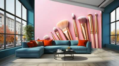 Cosmetic makeup brush on a pink background. Cosmetic product for make-up. Creative and beauty fashion concept. Fashion. Collection of cosmetic makeup brushes, top view, banner Wall mural