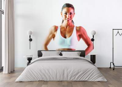  Beautiful and fit woman training with gym equipment. Concept about sport and fitness Wall mural