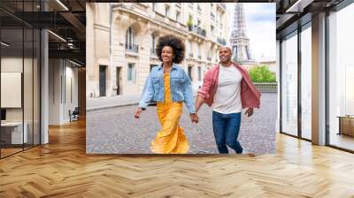 Afro-american beautiful couple in love visiting Paris Wall mural