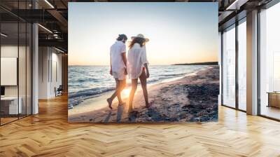 Couple on a tropical beach Wall mural