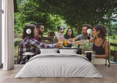 Group of friends spending time making a picnic Wall mural