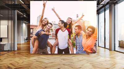 Group of friends spending time together on a rooftop in New york city, lifestyle concept with happy people Wall mural