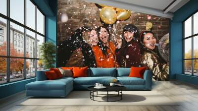 Group of girls celebrating and having fun the club. Concept about women night out Wall mural