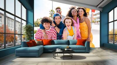 Group of young best friends bonding outdoors - Multiracial happy people having party at the beach during summertime Wall mural