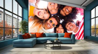 Group of young best friends bonding outdoors - Multiracial people bonding and having fun at the beach during summer vacation Wall mural