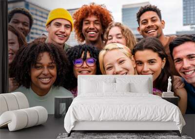 Happy playful multiethnic group of young friends bonding outdoors - Multiracial millennials students meeting in the city, concepts of youth, people lifestyle, diversity, teenage and urban life Wall mural