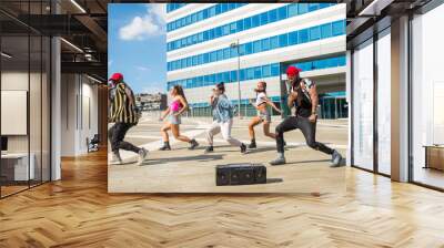 Hip hop crew dancing outdoors Wall mural