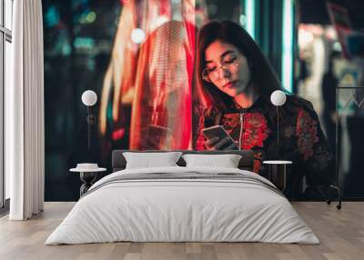 Pretty asian woman portrait with led lights Wall mural