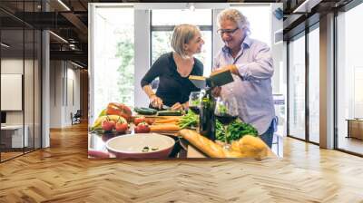 Senior couple cooking Wall mural