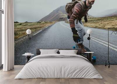 Skater traveling iceland on his longboard Wall mural