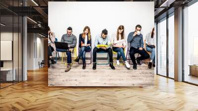 Start up people sitting in a row Wall mural