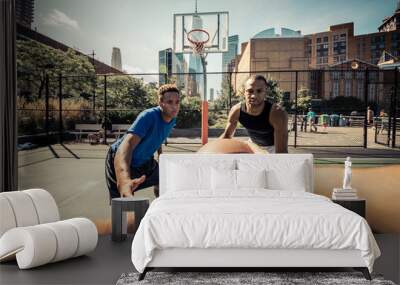 Two street basketball players playing hard on the court Wall mural