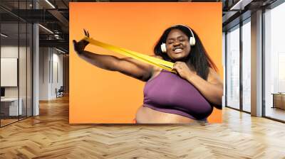 Young woman making pilates and functional training at the gym Wall mural