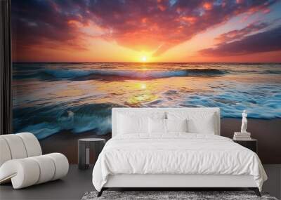 Beautiful sunset over the sea with a view at coconut tree on the white beach Wall mural