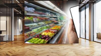 Grocery shopping at upermarket mall grocery store vegetable healthy food smart phone online supermarket Wall mural