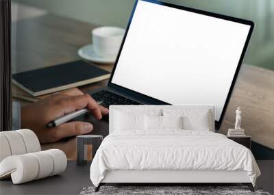 male hands and a laptop with a blank screen in a cafe Mock up Blank-screen computer desktop Wall mural