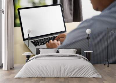 man working on his laptop with blank copy space Laptop with blank screen Mock up Blank screen computer Wall mural