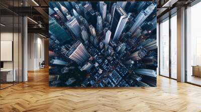 A bird's-eye view of a sprawling cityscape at twilight with urban downtown buildings densely packed Wall mural