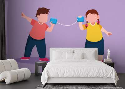 Character flat drawing adorable little boy and girl play toy phone. Two friends playing in phone with self made speech transmitting device, kids have fun speaking. Cartoon design vector illustration Wall mural