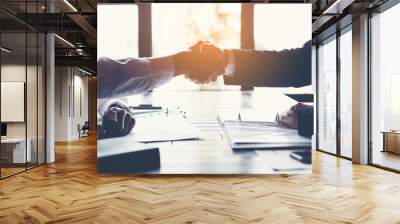 business partners handshaking after business success negotiation at meeting room. Wall mural