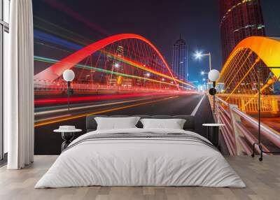 abstract image of blur motion of cars on the city road at night，Modern urban architecture in tianjin, China Wall mural